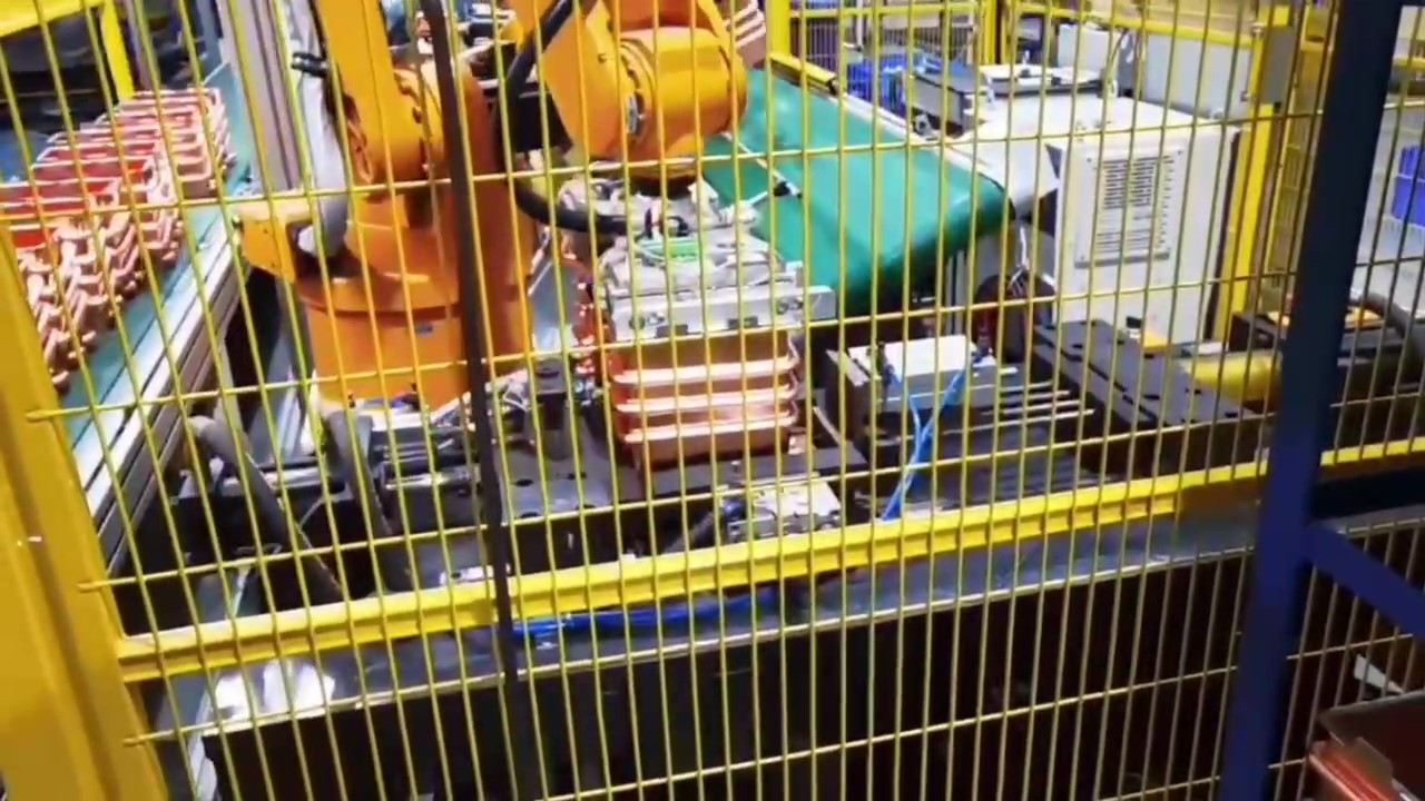 給湯器熱交換器自動拡管ライン